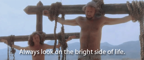 Brian hanging on a cross singing 'Always look on the bright side of life'.